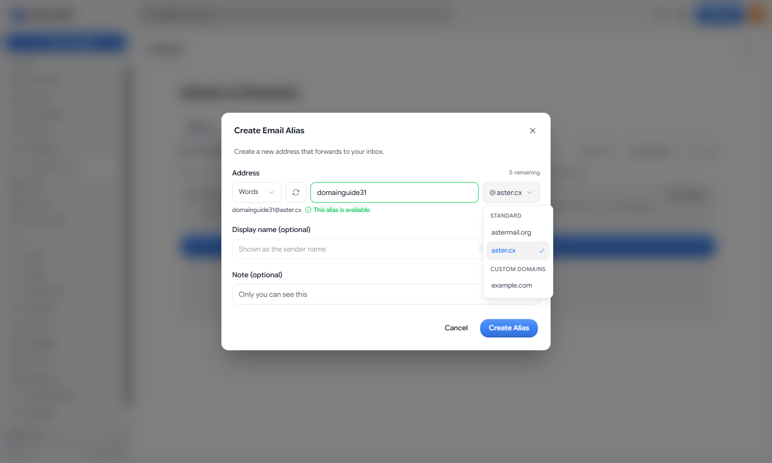 The Create Email Alias dialog with the domain selector open, showing example.com under Custom Domains